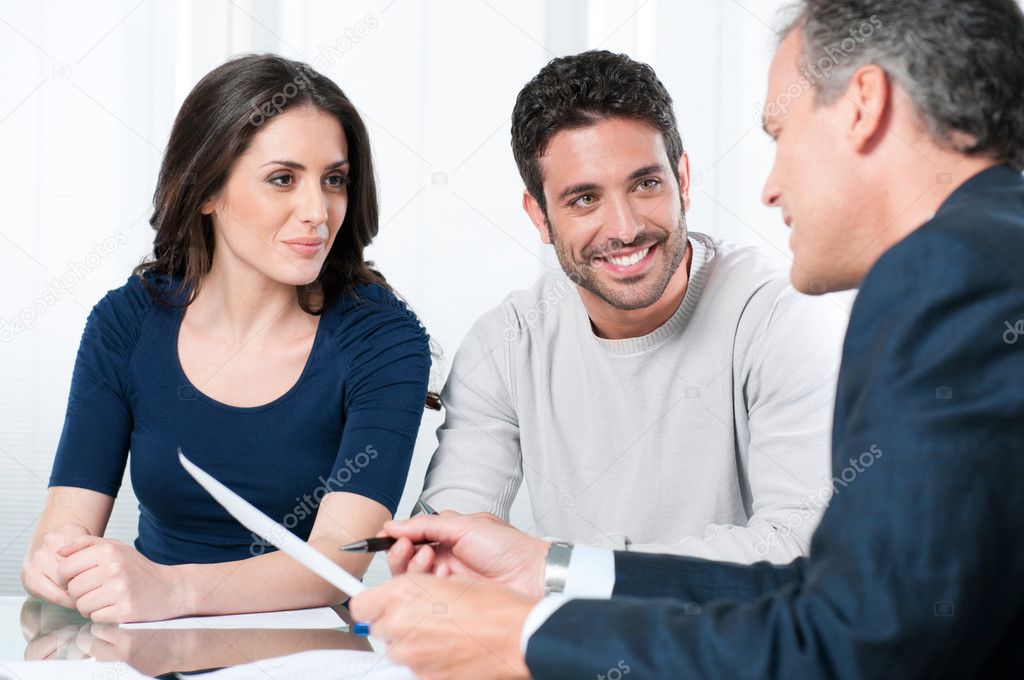 Attorney and client reviewing a structured legal strategy in an office
