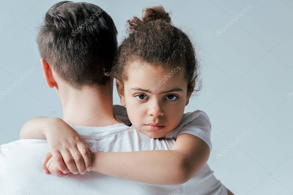 Parent reviewing a parenting schedule in a calm office setting