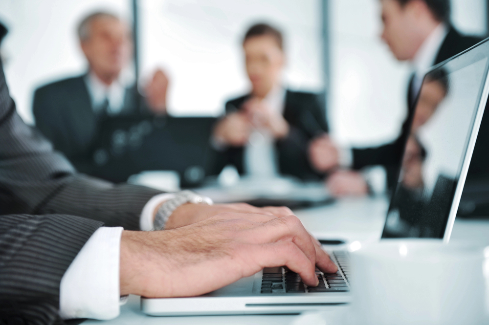 Attorney offering thoughtful legal advice in a quiet conference room