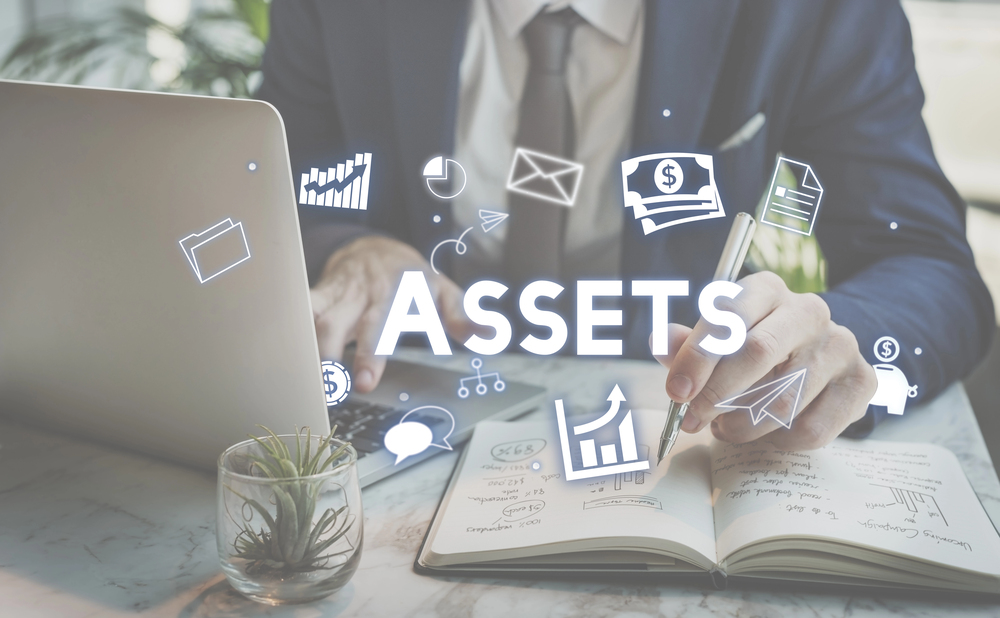 Financial documents, spreadsheets, and notes organized for divorce property division