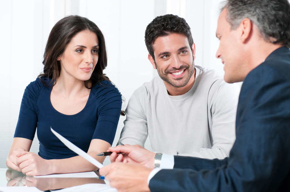 Attorney and client reviewing a structured legal strategy in an office