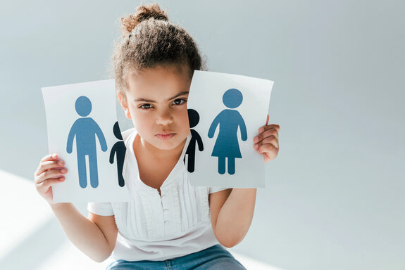 Parent reviewing a parenting plan document in a calm office setting