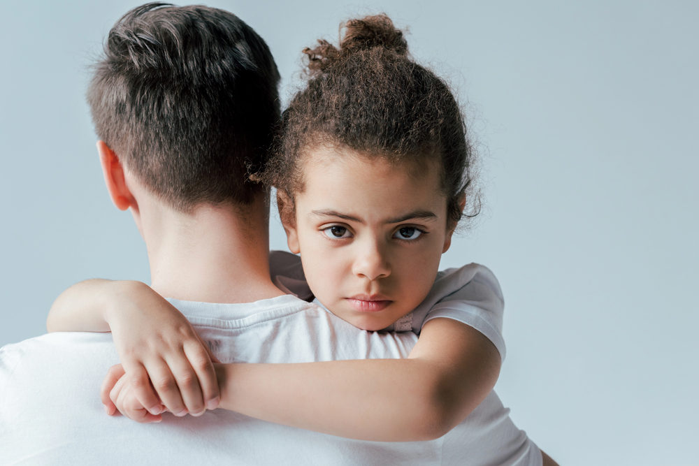 Parent reviewing a parenting schedule in a calm office setting