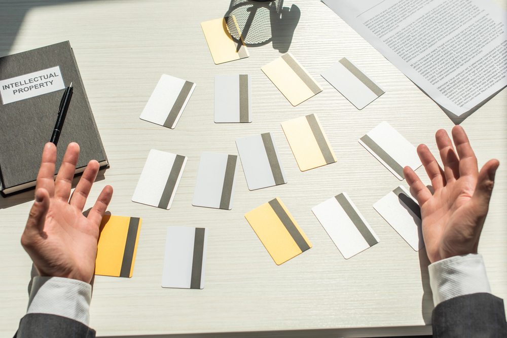 List of loans and credit card statements on a table
